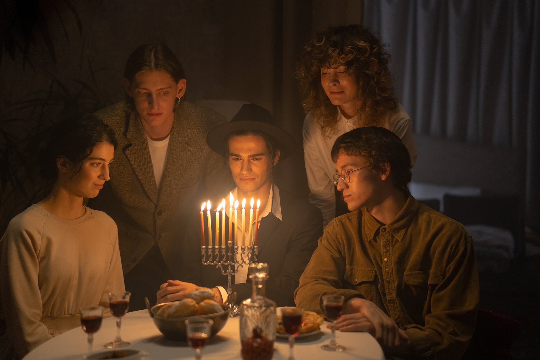 family celebrating hanukkah